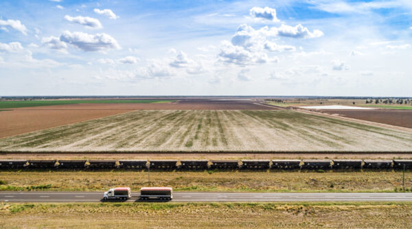 Aerial view of the freight train moving along the farmland, North Star, New South Wales