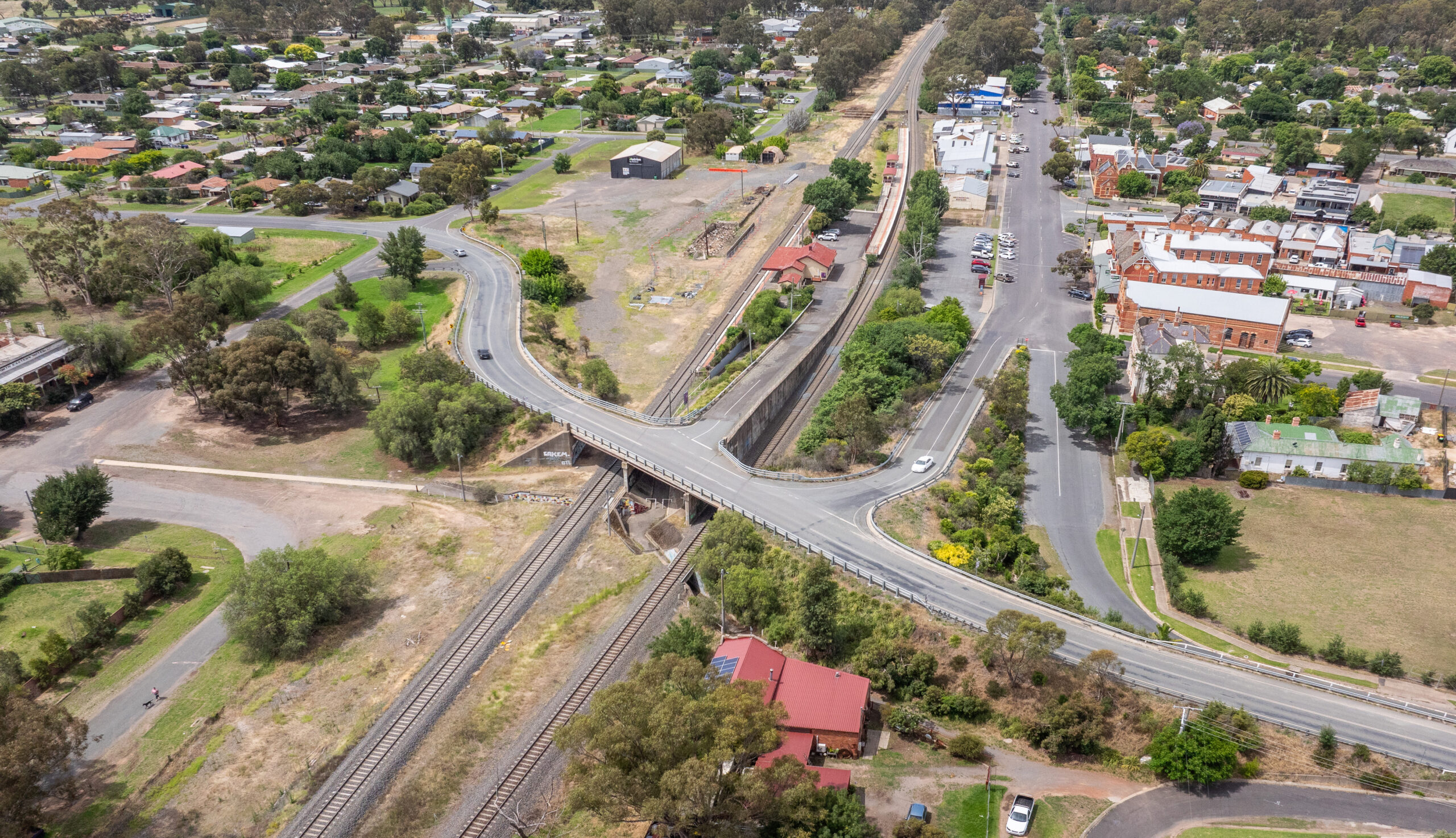 Aerial image of Euroa railway station with road bridge over two railway lines.