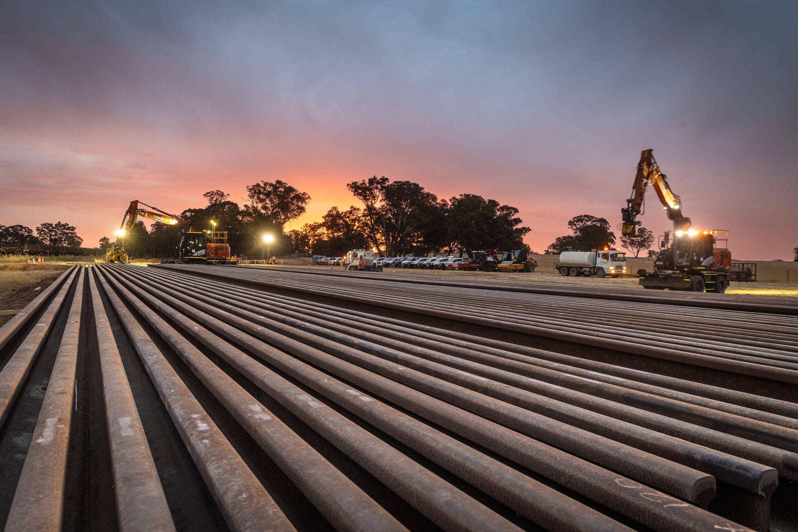 Rail lengths delivered with sunset in the background