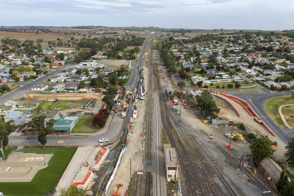 A railway worksite in the middle of a rural township.