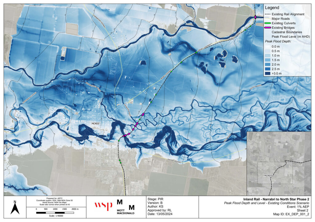 A satellite image of a rural town showing an area of water flowing from creeks and rivers across the landscape.